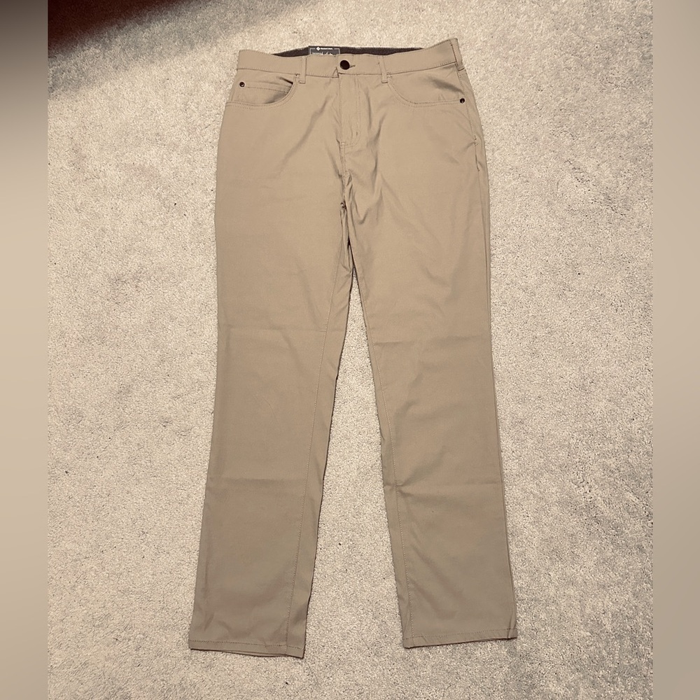 Men's Tan Denali Pants 
- Durable Stretch Fabric
- Zip Utility Pocket